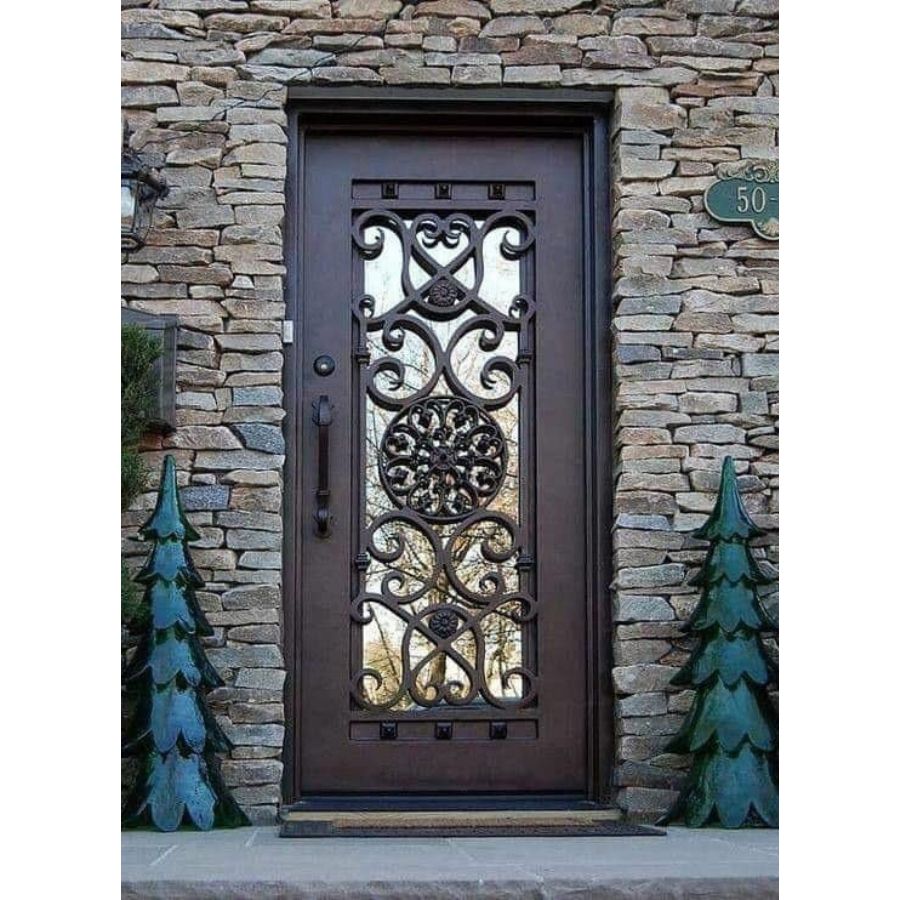 puerta de herreria moderna con detalles circulares en hierro