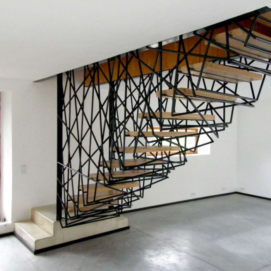 escalera de herreria estilo moderno y exotico que se sujeta del techo
